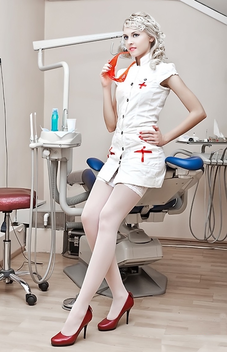 Blonde Nurse wearing White Opaque Stockings and White Short Dress